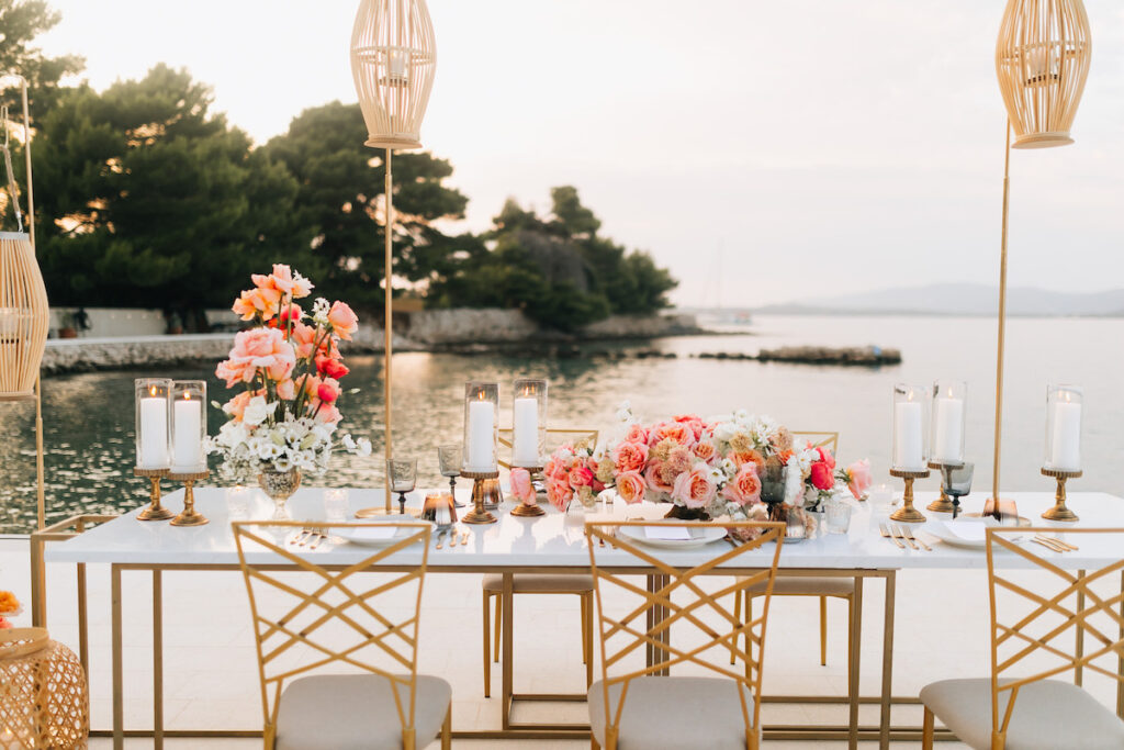 Gourmet seafood dish served on an elegant plate, featuring local ingredients like truffles and artisanal cheeses, with glasses of Croatian wine in the background.
