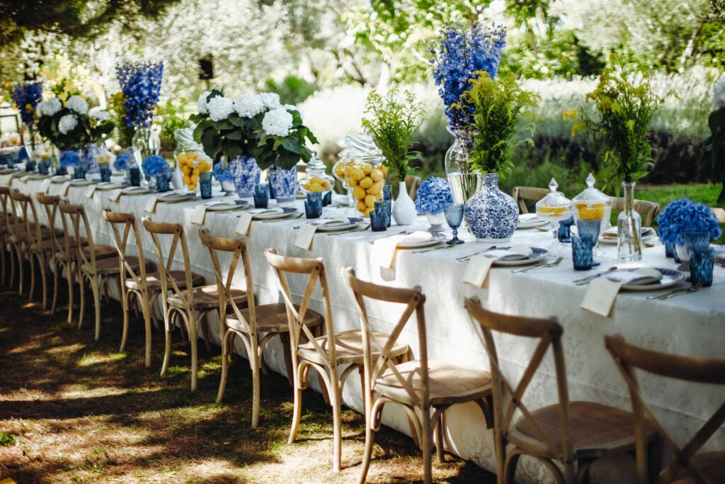 Stunning outdoor event venue by the Adriatic Sea, surrounded by lush greenery and lemon-themed decorations.