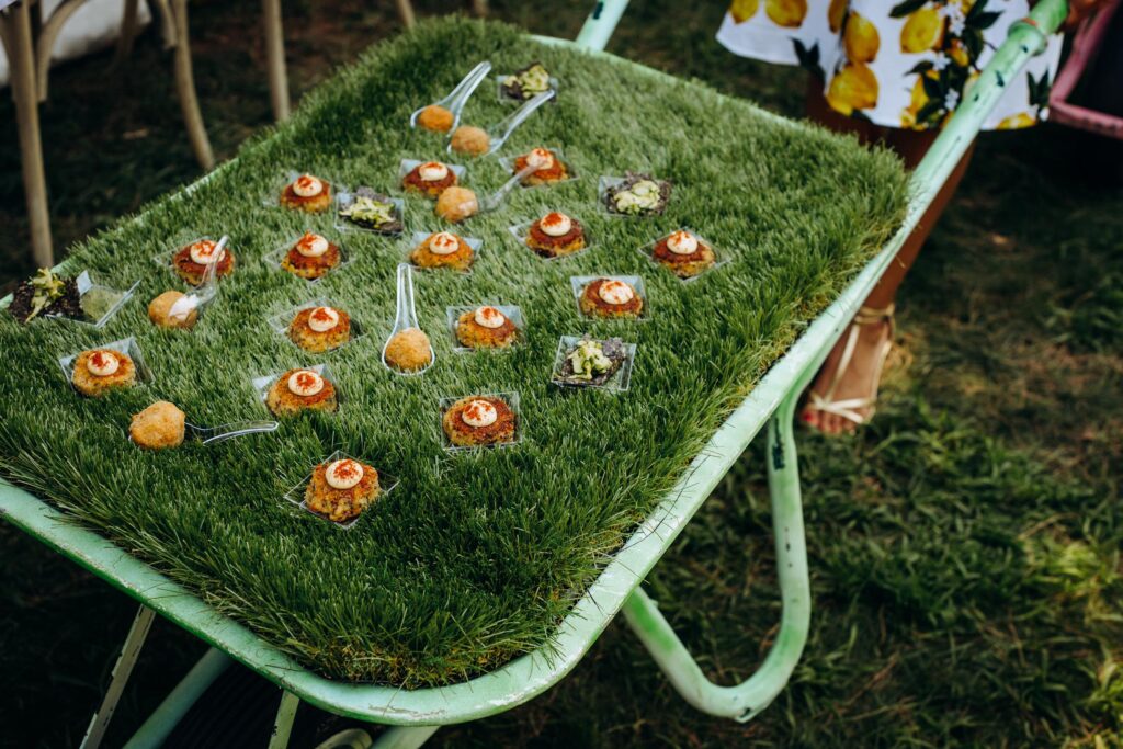 Stunning outdoor event venue by the Adriatic Sea, surrounded by lush greenery and lemon-themed decorations.