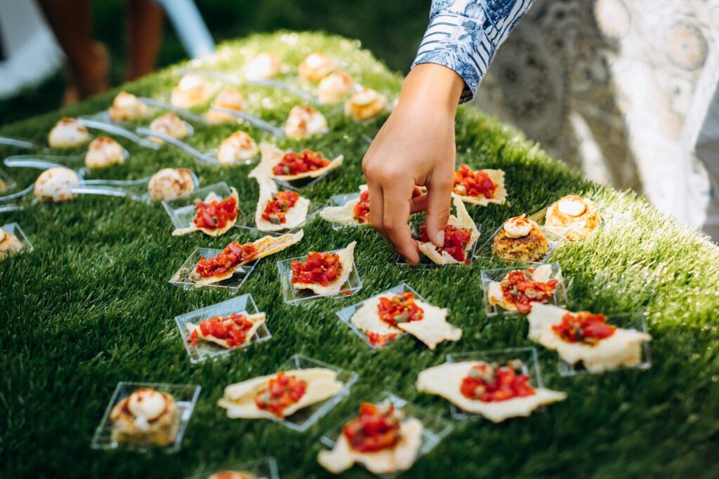 Stunning outdoor event venue by the Adriatic Sea, surrounded by lush greenery and lemon-themed decorations.