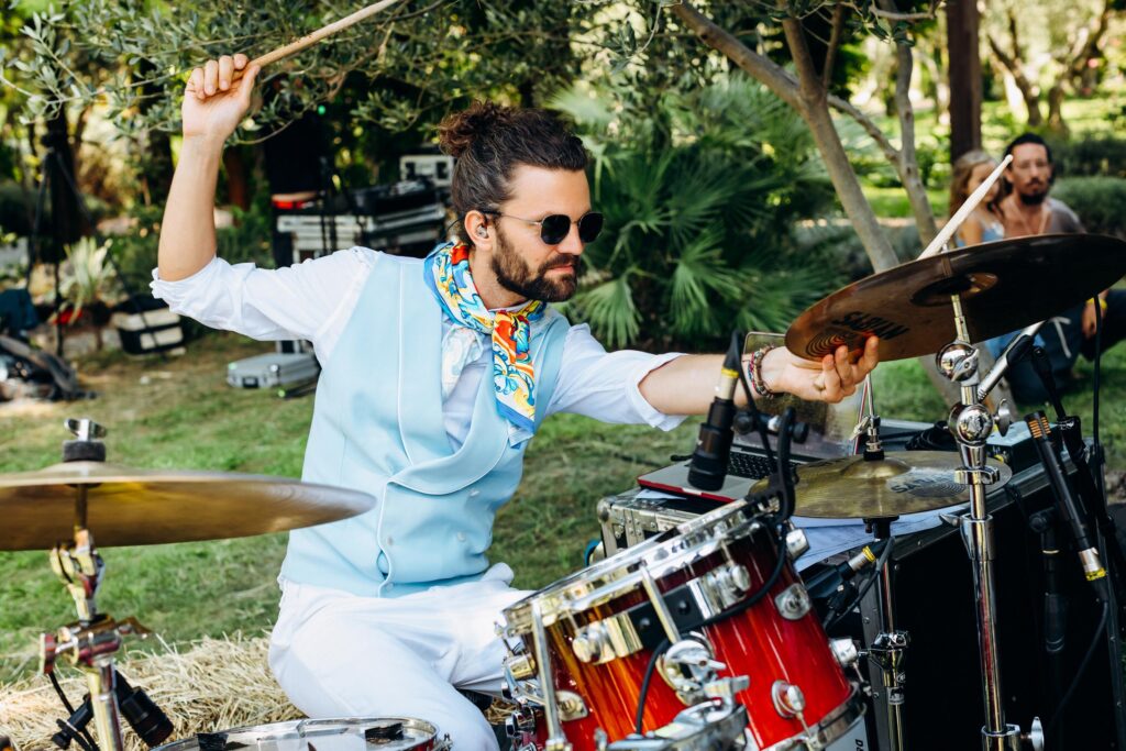 Stunning outdoor event venue by the Adriatic Sea, surrounded by lush greenery and lemon-themed decorations.