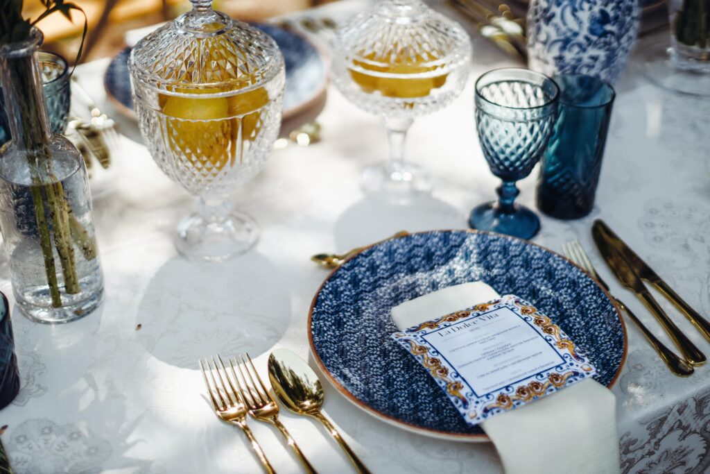 Stunning outdoor event venue by the Adriatic Sea, surrounded by lush greenery and lemon-themed decorations.