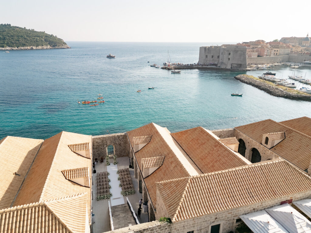 Wedding Setup at Lazareti Dubrovnik – A beautifully decorated wedding ceremony setup in the charming courtyard of Lazareti.