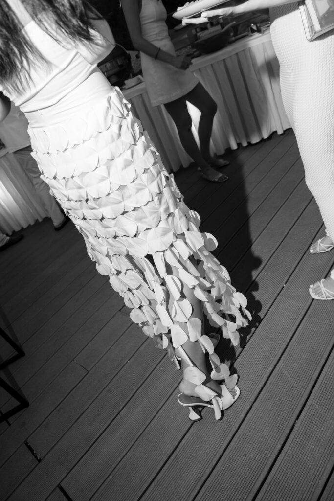 Morgan and Robbie’s three-day Dubrovnik wedding with a Hilton welcome dinner, Banje Beach party, and St. Lawrence Fortress ceremony, featuring signature cocktails, vintage bells, drummers, and a lively French band.