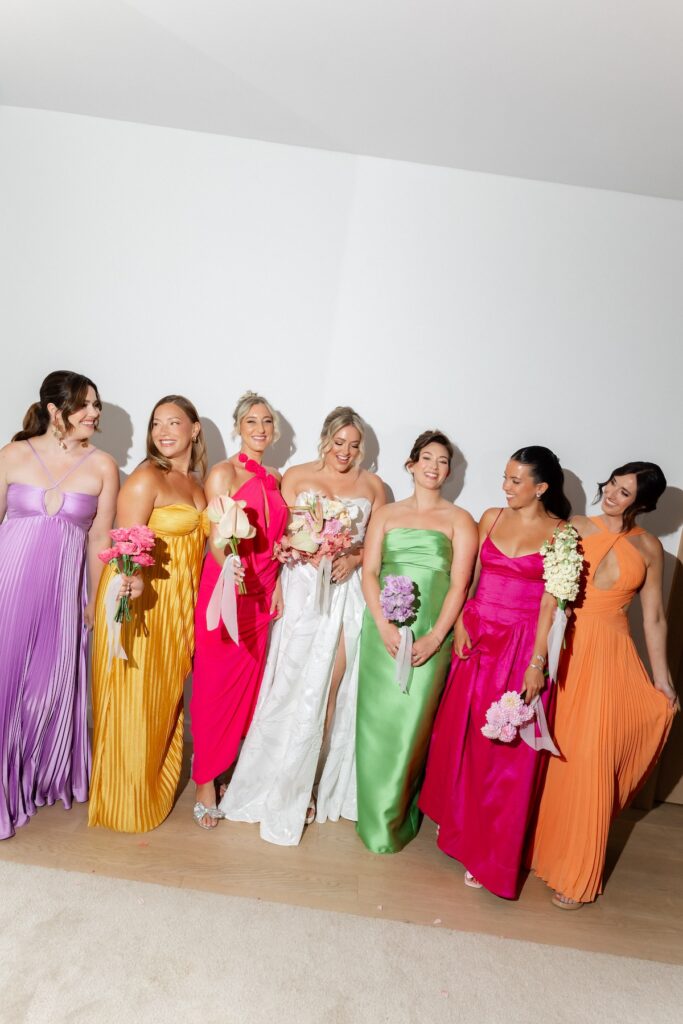 Bridesmaids Croatia wearing colourful dresses