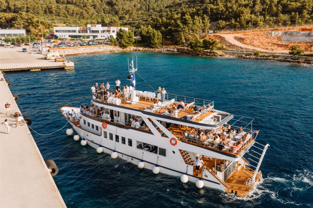 Boat party with DJ and champagne en route to Maslina Resort Hvar Island