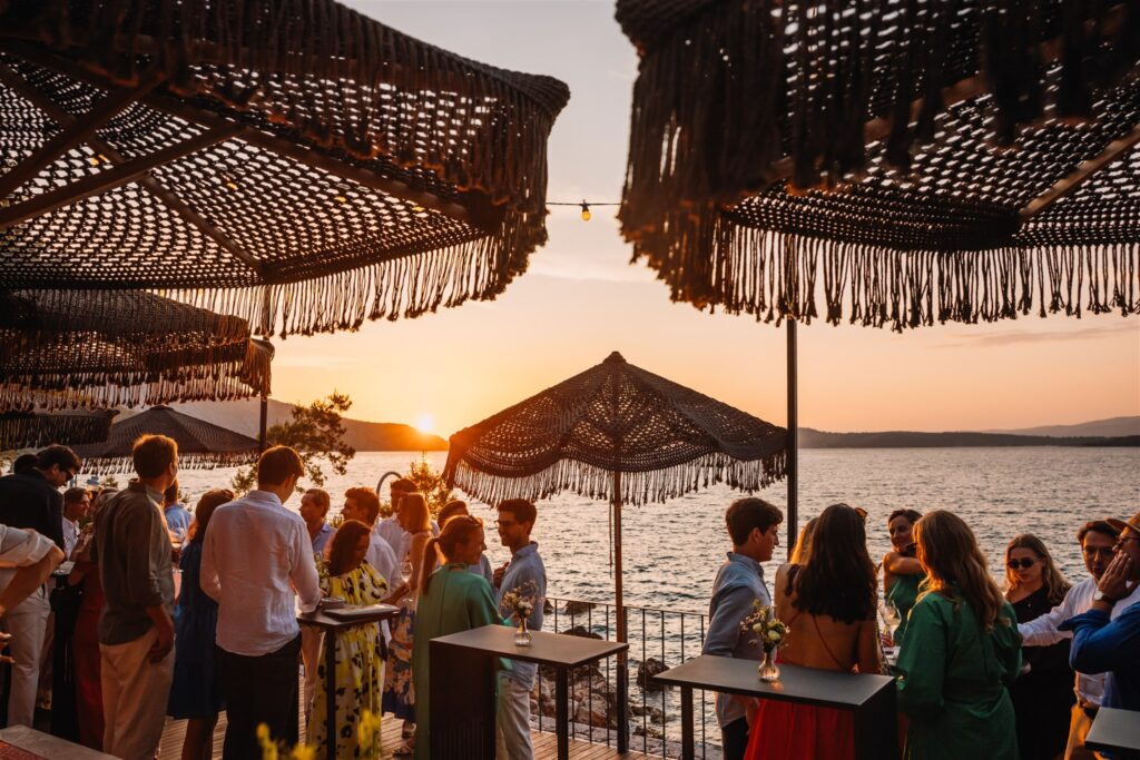 Sunset welcome party at Maslina Resort with cocktails and sea views