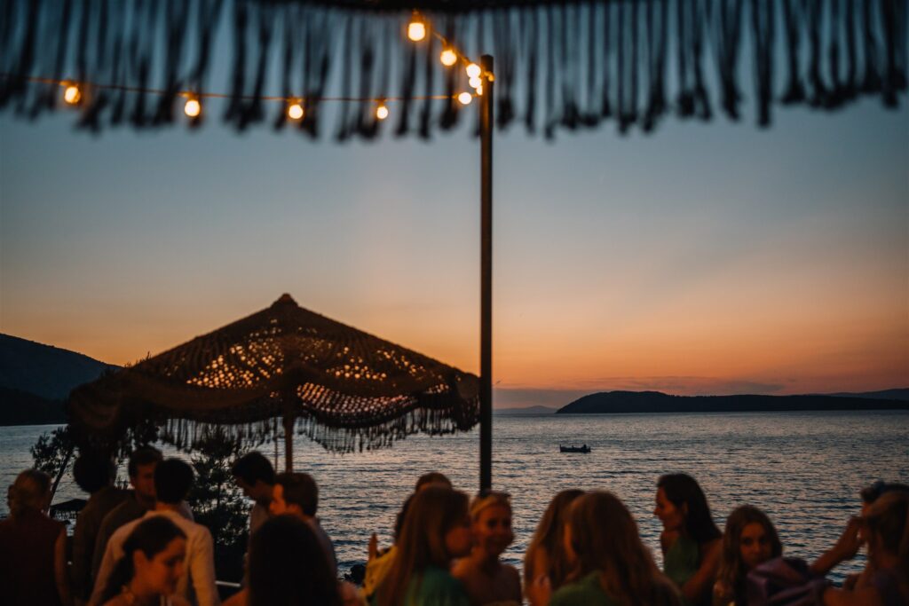 Sunset welcome party at Maslina Resort with cocktails and sea views
