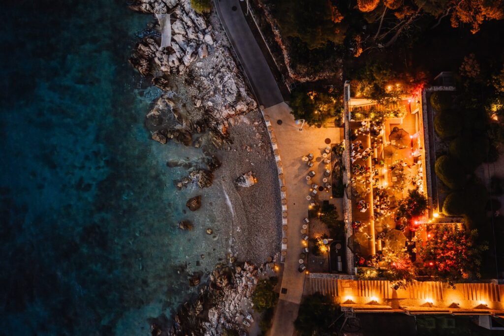 Sunset welcome party at Maslina Resort with cocktails and sea views