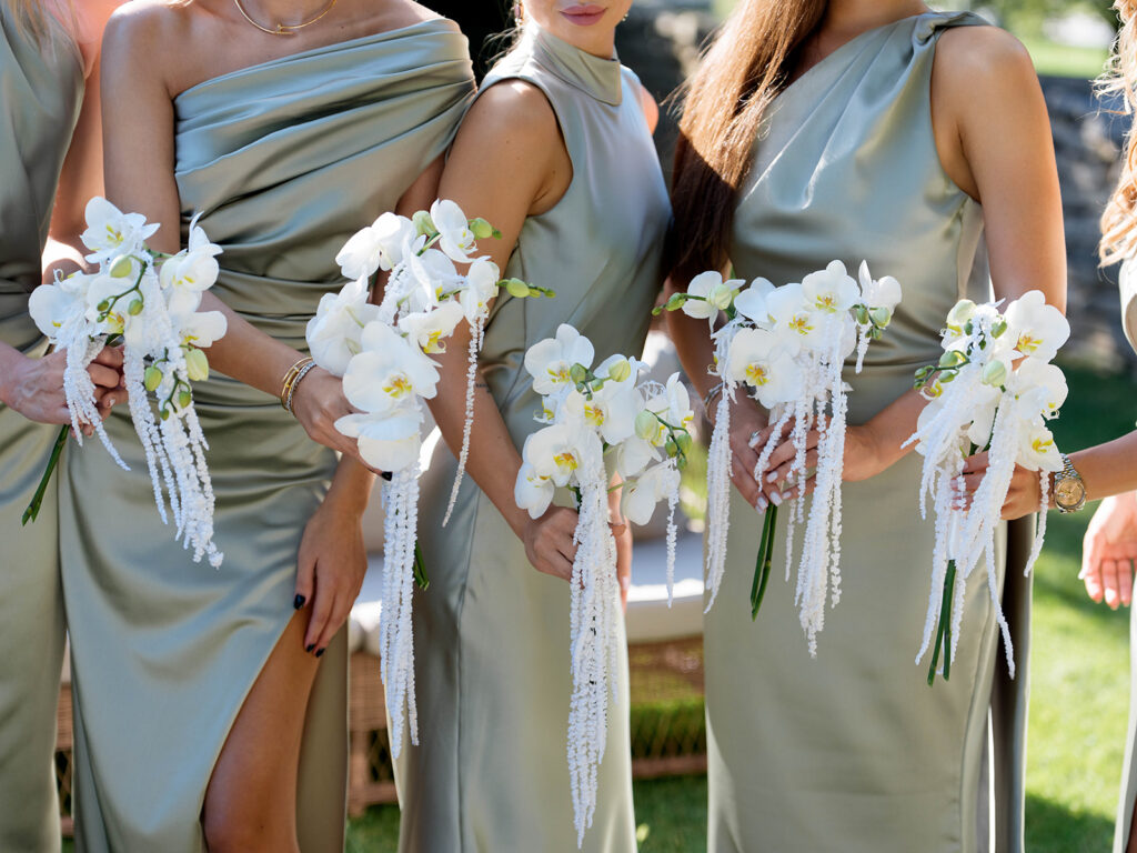 Refined-bridal-bridesmaids-bouquets-at-a-Meneghetti-wedding