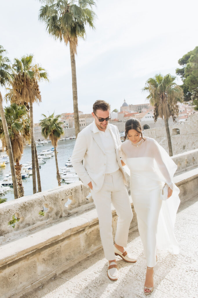 Wedding Couple walking in Dubrovnik to their welcome event