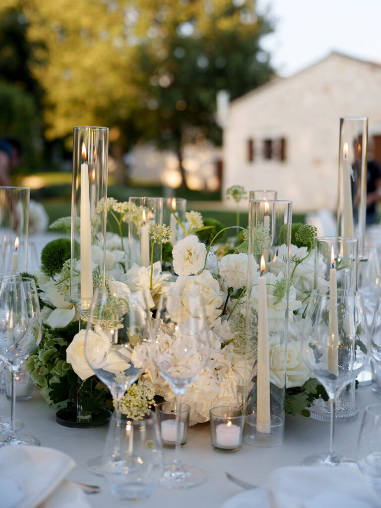 White floral wedding centerpiece at Meneghetti Istria